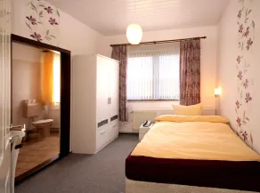 Familien- und Apparthotel Strandhof - Zimmer