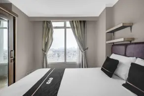 OYO 95111 Patria Park View - Zimmer