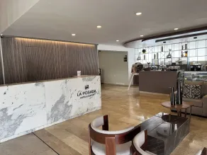 La Posada Hotel y Suites - Rezeption