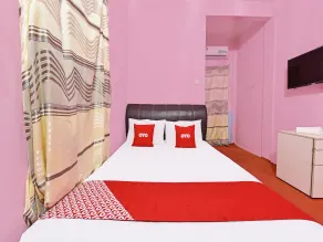 Capital O 90664 Rabi Hotel - Chambre