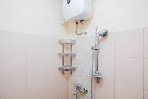 Cozy and Simply Studio Tifolia Apartment near Kelapa Gading By Travelio - Bathroom