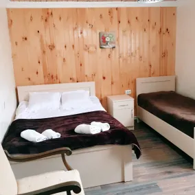 Manoni Ratiani's Guesthouse - Zimmer