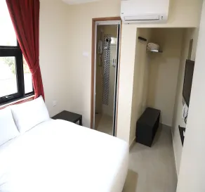 Capital O 90897 Island City Hotel - Room