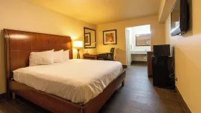 Magnuson Extended Stay and Suites Airport Hotel - Zimmer