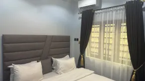 Next Level Hotel & Suites - Værelse