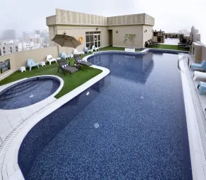 Corp Executive Hotel Doha Suites - Pool