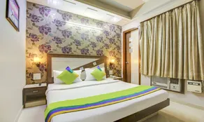 Treebo Rockwell Plaza - Room