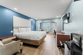 Executive Inn & Suites Magnolia - Chambre