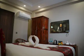 Treebo Aashirwad Bliss Inn With Swimming Pool - Zimmer