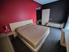Sunrise Hotel - Zimmer