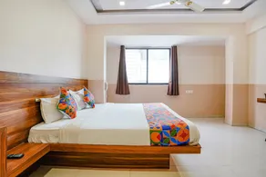 Fabhotel Paradise Inn - Habitación