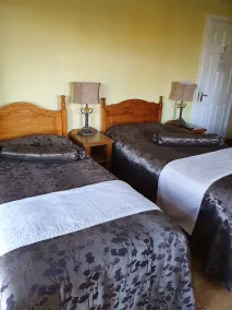 GoldenDawn Guest House - Habitación