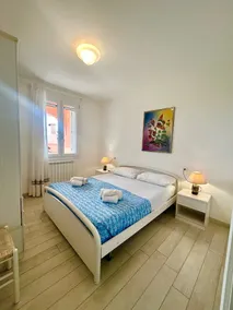 Retiro en un jardín junto al mar en Albarella - Habitación