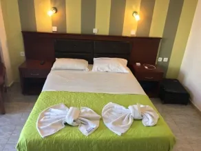 Amoudi Studios Apartments Hotel - Chambre