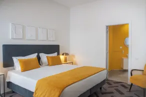 Glória Suites Hotel by Succeed - Chambre