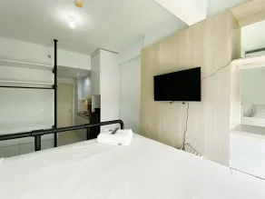 Simply Look Studio Room at Patraland Urbano Apartment By Travelio - Værelse