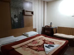The Kanchi Residency - Habitación