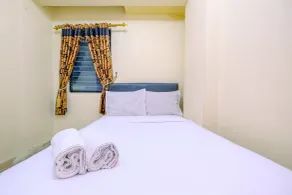 Comfort and Cozy Living 2BR at Cibubur Village Apartment By Travelio - Zimmer