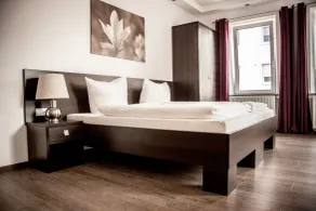 Aparthotel - Stadtvilla Premium - Chambre