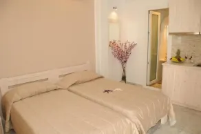 Starlight Luxury Studios - Chambre