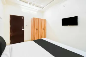 Super Townhouse Kokapet Near GAR - Habitación