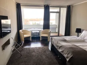 Rheinblick Apartments - Chambre