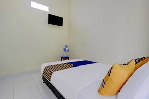 SPOT ON 90577 Griya Afifah Syariah - Habitación