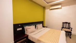 Harshavardhana Inn - Room