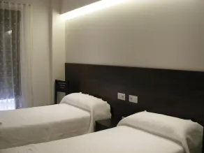 Imprenta Musical Alojamiento - Chambre