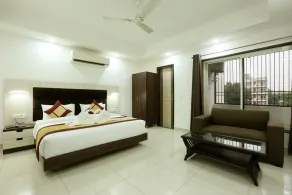 Green Lotus Residency Dwarka - Vista do quarto