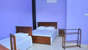 Omega Hotel & Motel - Quarto