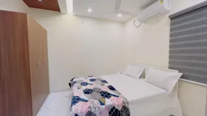 IZEL CASA Near Amrita Hospital - Chambre