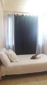 EKONUMI ROOMS at Moonwalk Paranaque - Chambre