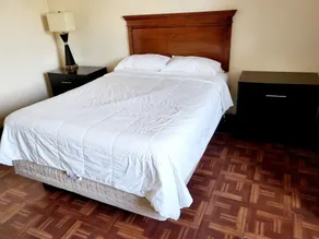 Metro Inn & Suites - Room