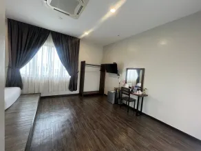 Capital O 91170 Kurau Bay Hotel - Habitación
