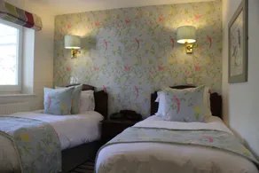 Roman Camp Inn - Værelse