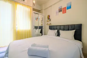 New Room Studio at Green Pramuka City Apartment By Travelio - Habitación