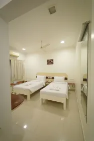 Hotel Palmyra Grand Inn - Chambre