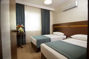 Supreme Hotel - Chambre