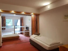 Kinder- und Familienhotel Nockalm - Habitación