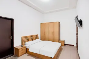 Hotel O Balikpapan near Taman Beruang Madu formerly Palm Cafe Inn - Room
