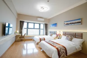 Yue Tu Apartment Hotel - Pokój