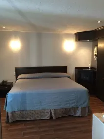 Olux Hotel-Motel-Suites - Chambre