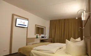 Confour Hotel - Zimmer