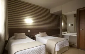 Hotel Continental Business - 200 metros do Complexo Hospitalar Santa Casa - Habitación