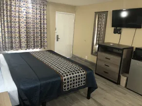 Luxury Inn & Suites - Room