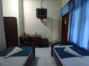 Capital O 93024 Hotel Ganesha - Habitación