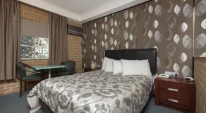 Grand Manor Motor Inn - Zimmer