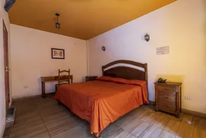 Mesón Real Hotel & Suites - Chambre