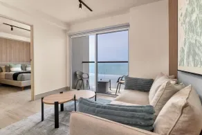 Surfside Beachfront Suites by Playa Caracol Resorts - Room